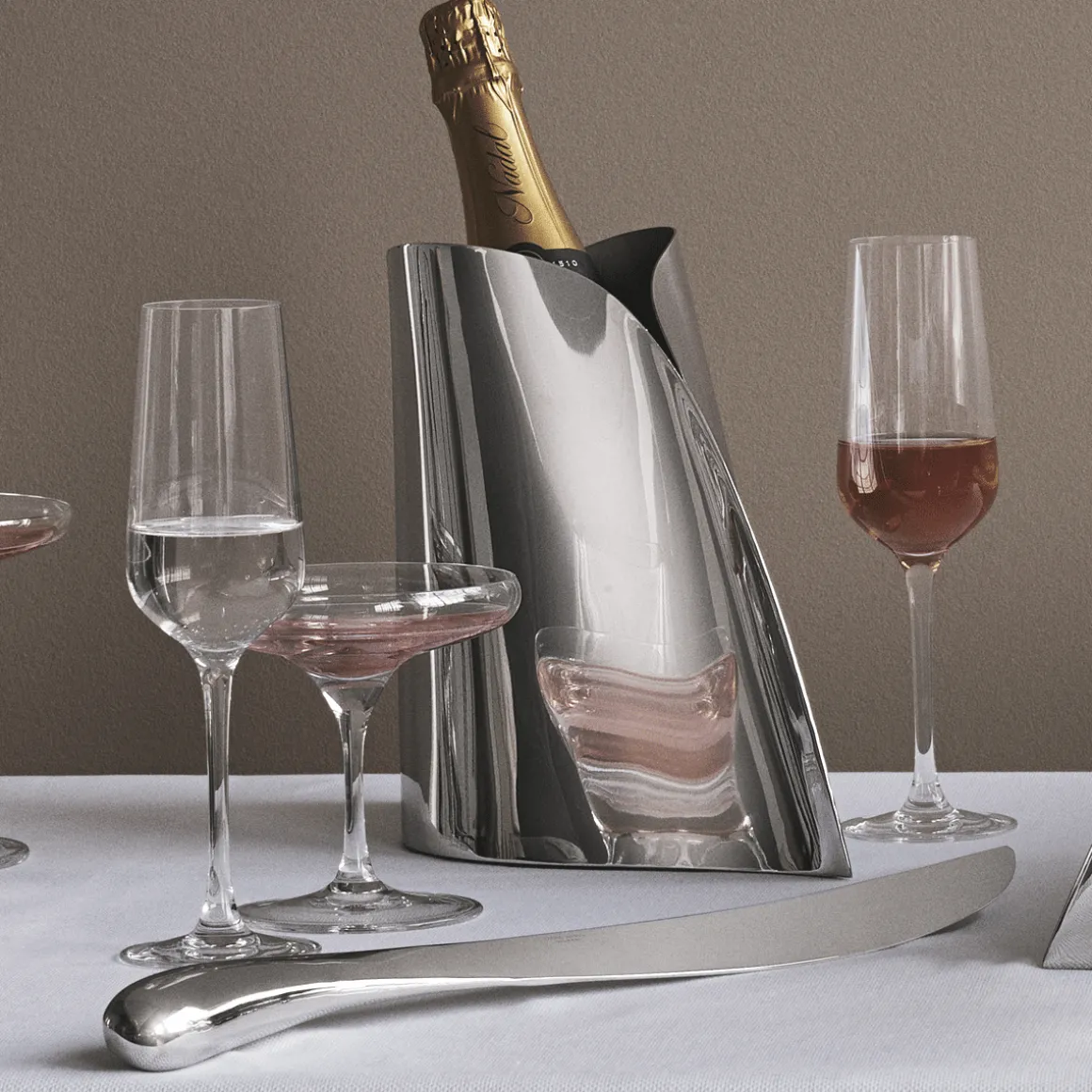 georg_jensen_champagnesab_1.webp GEORG JENSEN CHAMPAGNESABEL INULGENCE