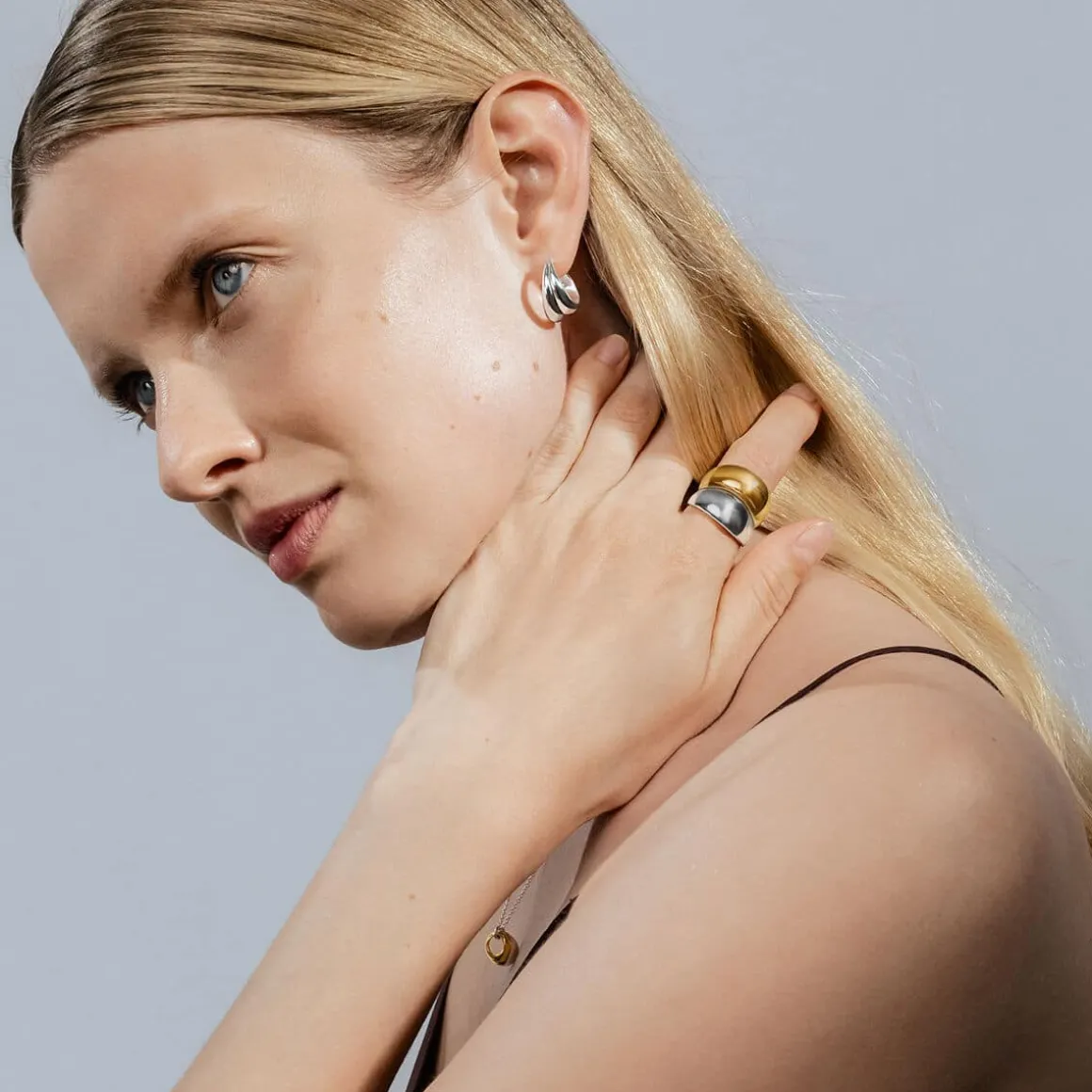 georg_jensen_ring_bred_cu_1.webp GEORG JENSEN RING BRED CURVE SØLV & GULL
